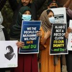 Outrage after hijab-wearing woman heckled by Hindu mob in India