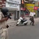 Police use live ammunition on Muslim protestors; two dead