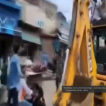 Far-right Vishwa Hindu Parishad and Bajrang members marched with a bulldozer during Shobha Yatra.