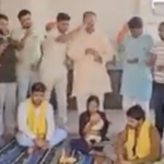 Hindu Raksha Dal leader Pinky Chaudhry conducts religious conversion ceremony of two Muslim families.