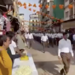 Rashtriya Swayamsevak Sangh members took out a military style parade inuniform holding sticks