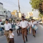 Members of the Rashtriya Swayamsevak Sangh marched through the streets, wielding canes to the beats of drums