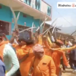 Shobha Yatra participants flash swords while marching through a village in Giridih