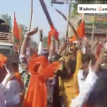 Shobha Yatra participants flash swords while marching through Purnia